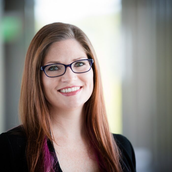 Personal brand portrait, warm natural light, on-location in Kansas City.